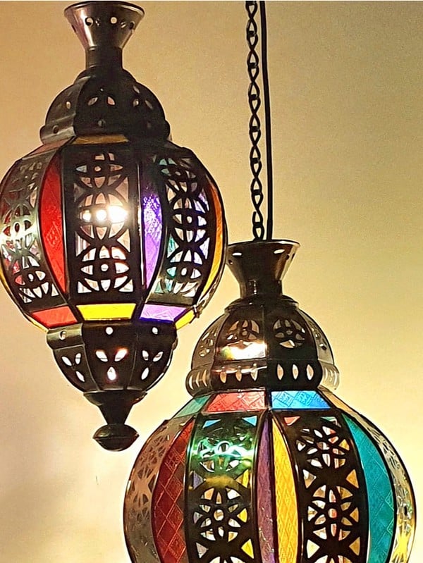 Moroccan Light  - cutout metal  - Create an ambience in your spaces - have them hardwired by an electrician or light a large candle in them for a glow. Each glass lantern has a large door on the side for easy access.