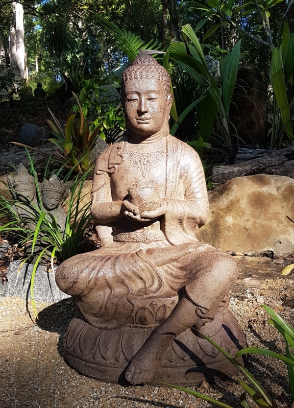 Buddha sitting - 80x45x40cm -made from (GRC) a stone composite material. Sturdy in the garden but able to be moved by two people.