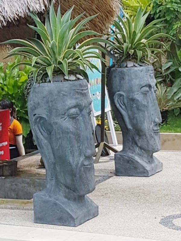 Tall Balinese Head Planter- 100x40x40cm  made from (GRC) a stone composite material. Sturdy in the garden but able to be moved by two people.