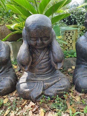 Hear No Evil Buddha 60x37x30cm - made from a stone composite material. Three available- see no evil, hear no evil, speak no evil statues.