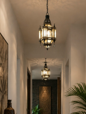 Handcrafted in Bali from glass and brass, this rust-resistant 50 x 30 cm Moroccan-style lantern brings instant warmth and character to any space.