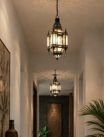 Handcrafted in Bali from glass and brass, this rust-resistant 50 x 30 cm Moroccan-style lantern brings instant warmth and character to any space.