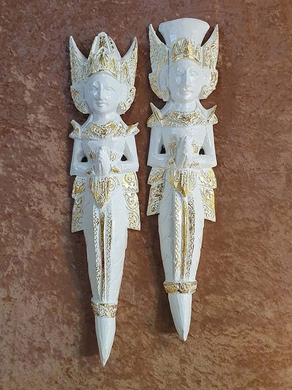 Balinese wall hangings CPW30 - Rama & Sita hand carved by the creative Balinese. Hang them beside your door as a special welcome to your guests.