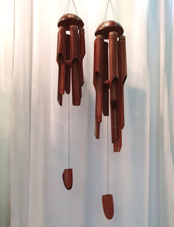 Wind chimes Bamboo with Coconut - 60cm or 40cm long   Hand carved by the creative Balinese. Add peaceful Balinese sounds in your home or garden.