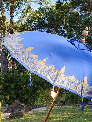 Balinese Umbrella -2 metres - Trimmed with Gold - Hearts and tassels. Our Balinese umbrellas are a stunning addition to any space.