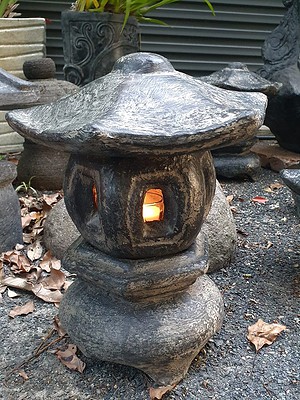 Concrete garden lantern 35cm CPS 117 is designed for both interior and outdoor use by the creative Balinese. Add power or a candle for a special glow.