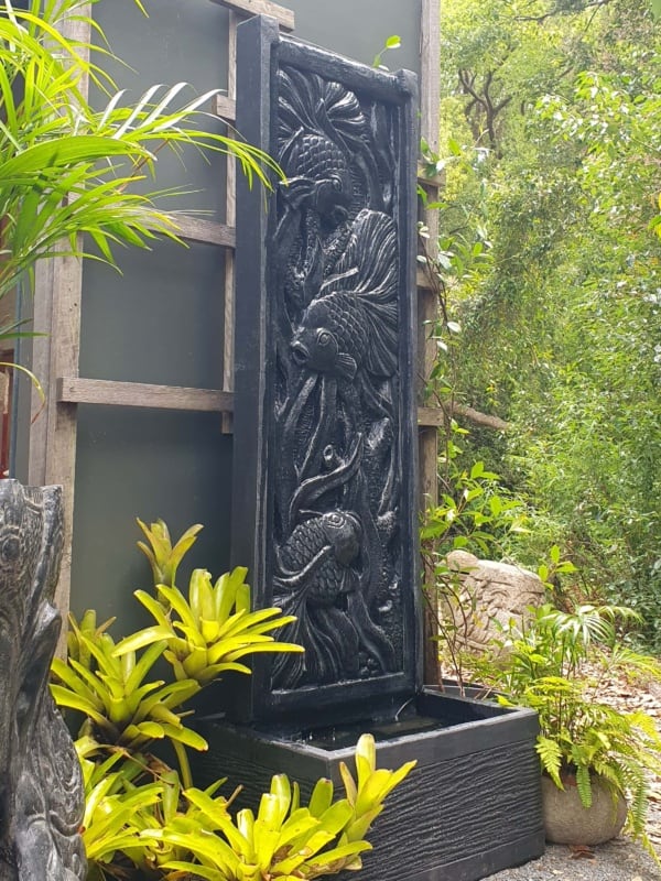 This Balinese Fish Fountain 185cm (pump incl.) CPS178 showcases a calming Bali style. it will make a statement in any space it is displayed in.