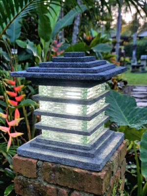 Lava Stone & Glass Light - CPS202 - 30x25cm from CasaPandan will illuminate your garden blending natural volcanic stone with elegant glass.