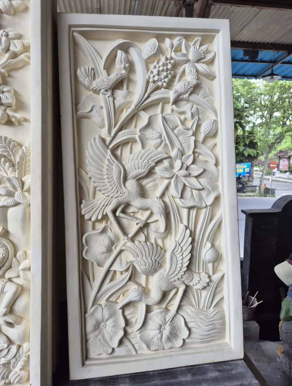 Elevate your space with the Bird & Lotus wall panel 100cm - CPD303 from CasaPandan. Handcrafted from durable moulded cement, it's perfect for all spaces.