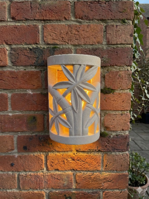 Balinese Carved Stone Wall Light - CPS20 - from CasaPandan. Handcrafted from high-quality Balinese limestone. Perfect for both indoor and outdoor settings.