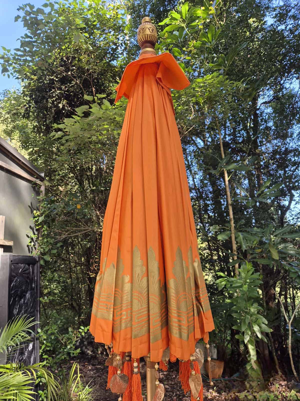 Balinese ORANGE Waterproof Umbrella 2m - CPU20 - Beautifully trimmed in gold with hearts and tassels. Handcrafted by skilled artisans in Bali.