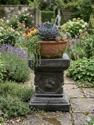 Simple, sturdy, and elegant. The Slate Grey Garden Pedestal 55cm pedestal from CasaPandan is handcrafted in Bali using Glass Reinforced Concrete (GRC).