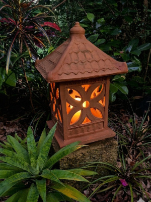 Introduce authentic Balinese charm to your landscape with this hand-crafted Terracotta Garden Lantern (CPU30) from CasaPandan.