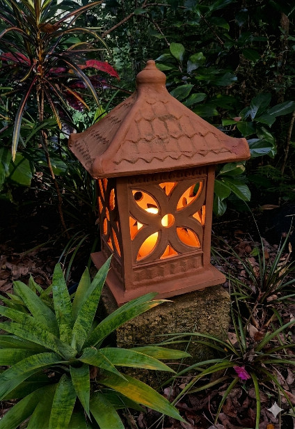 Introduce authentic Balinese charm to your landscape with this hand-crafted Terracotta Garden Lantern (CPU30) from CasaPandan.
