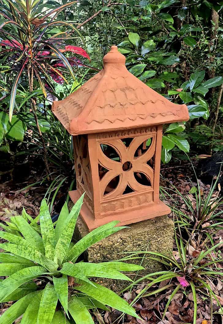 Introduce authentic Balinese charm to your landscape with this hand-crafted Terracotta Garden Lantern (CPU30) from CasaPandan.